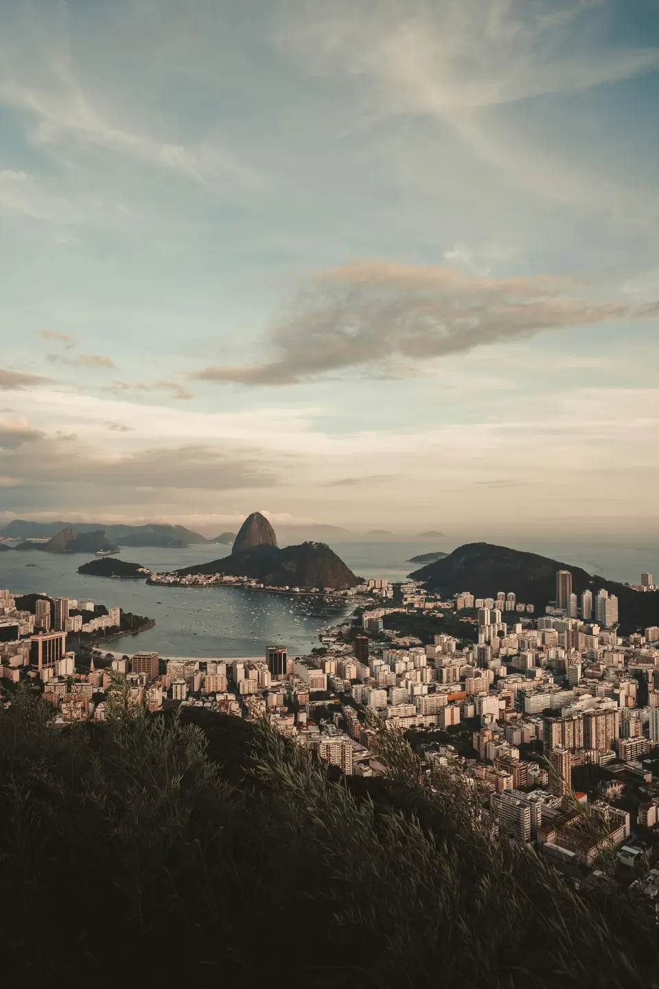 View over the city towards Sugarloaf Mountain and Guanabara Bay at dusk